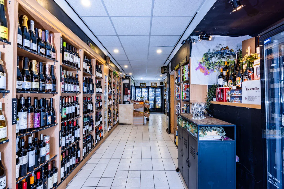 Inside The Beerhive, shelves of wine and beer